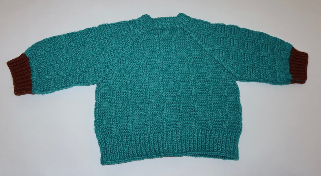 Hjemmestrikket cardigan
